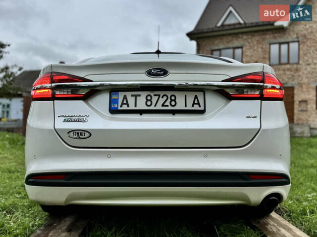 Білий Форд Фьюжен, об'ємом двигуна 2 л та пробігом 259 тис. км за 12499 $, фото 13 на Automoto.ua