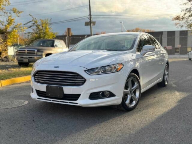 Білий Форд Фьюжен, об'ємом двигуна 2 л та пробігом 77 тис. км за 6200 $, фото 2 на Automoto.ua