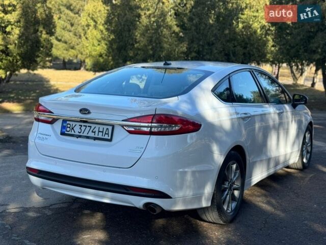 Білий Форд Фьюжен, об'ємом двигуна 1.5 л та пробігом 139 тис. км за 9499 $, фото 24 на Automoto.ua