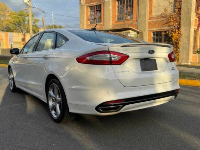 Білий Форд Фьюжен, об'ємом двигуна 2 л та пробігом 77 тис. км за 6200 $, фото 5 на Automoto.ua
