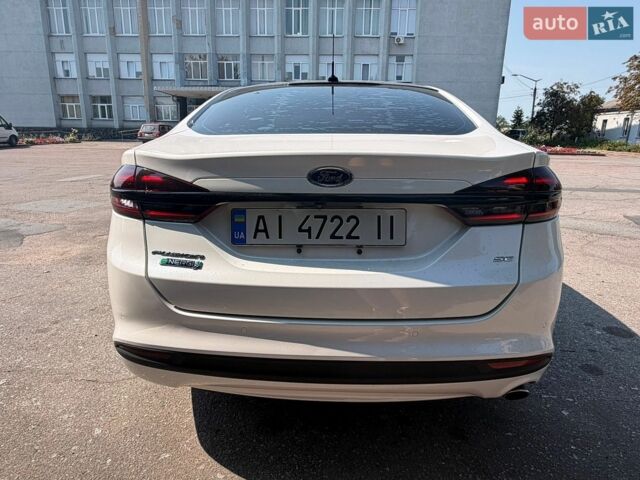 Білий Форд Фьюжен, об'ємом двигуна 2 л та пробігом 189 тис. км за 14500 $, фото 16 на Automoto.ua