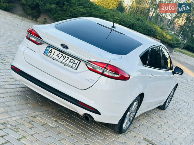 Білий Форд Фьюжен, об'ємом двигуна 1.5 л та пробігом 106 тис. км за 12500 $, фото 37 на Automoto.ua