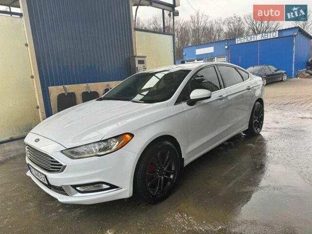 Білий Форд Фьюжен, об'ємом двигуна 2 л та пробігом 160 тис. км за 12100 $, фото 13 на Automoto.ua