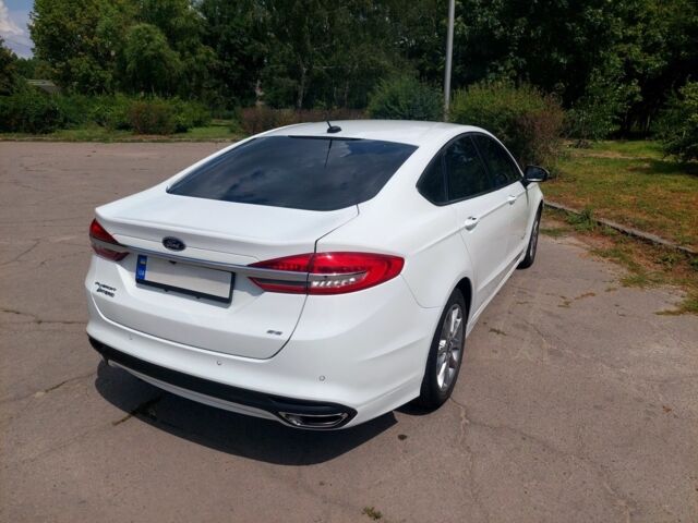 Белый Форд Фьюжн, объемом двигателя 2 л и пробегом 120 тыс. км за 14000 $, фото 1 на Automoto.ua