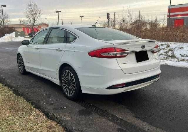 Білий Форд Фьюжен, об'ємом двигуна 2 л та пробігом 89 тис. км за 4400 $, фото 6 на Automoto.ua