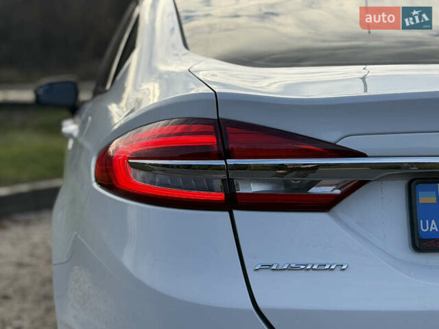 Білий Форд Фьюжен, об'ємом двигуна 2 л та пробігом 175 тис. км за 12500 $, фото 17 на Automoto.ua