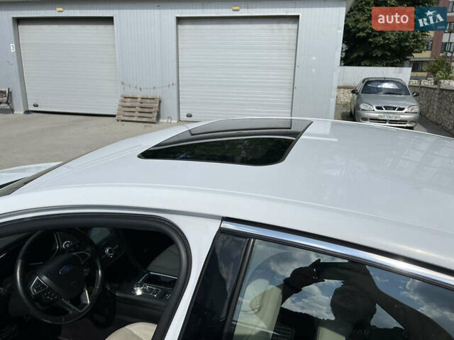 Білий Форд Фьюжен, об'ємом двигуна 2 л та пробігом 183 тис. км за 14500 $, фото 24 на Automoto.ua