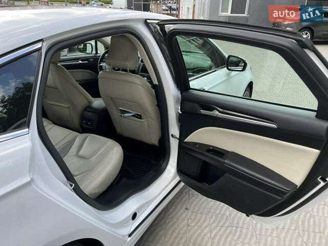 Білий Форд Фьюжен, об'ємом двигуна 2 л та пробігом 183 тис. км за 14500 $, фото 15 на Automoto.ua