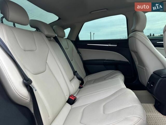 Білий Форд Фьюжен, об'ємом двигуна 2 л та пробігом 152 тис. км за 12800 $, фото 19 на Automoto.ua