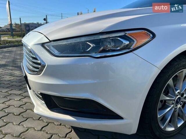 Білий Форд Фьюжен, об'ємом двигуна 2 л та пробігом 174 тис. км за 14700 $, фото 2 на Automoto.ua