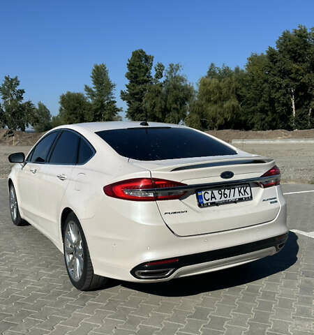 Білий Форд Фьюжен, об'ємом двигуна 2 л та пробігом 139 тис. км за 14000 $, фото 4 на Automoto.ua