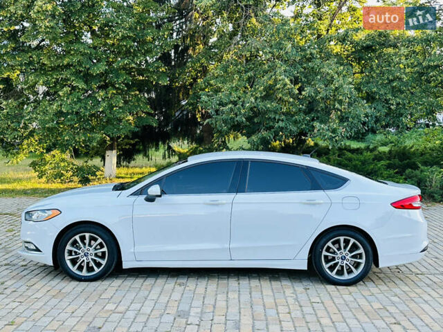 Білий Форд Фьюжен, об'ємом двигуна 1.5 л та пробігом 106 тис. км за 12500 $, фото 2 на Automoto.ua