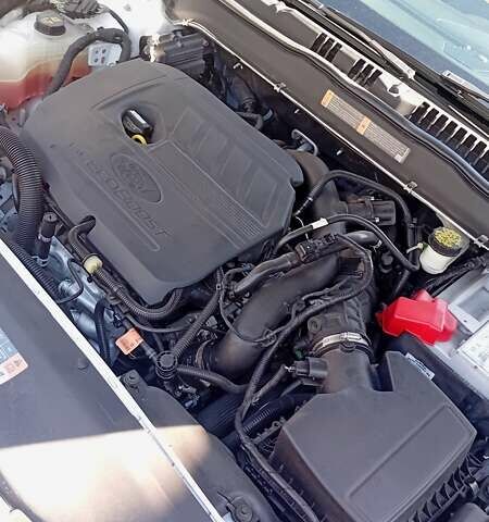 Білий Форд Фьюжен, об'ємом двигуна 1.5 л та пробігом 70 тис. км за 14000 $, фото 20 на Automoto.ua