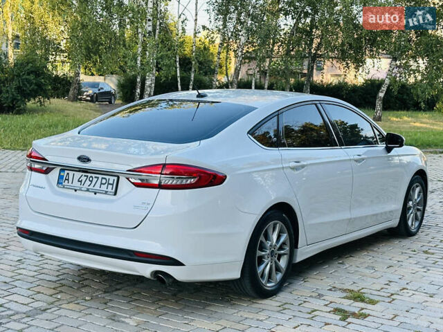 Білий Форд Фьюжен, об'ємом двигуна 1.5 л та пробігом 106 тис. км за 12500 $, фото 6 на Automoto.ua