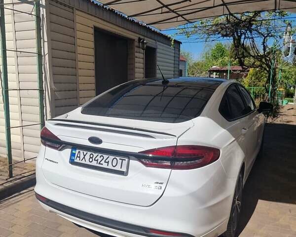 Білий Форд Фьюжен, об'ємом двигуна 2 л та пробігом 130 тис. км за 18600 $, фото 10 на Automoto.ua