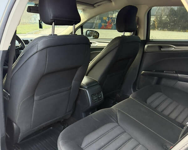 Білий Форд Фьюжен, об'ємом двигуна 2 л та пробігом 175 тис. км за 12500 $, фото 29 на Automoto.ua