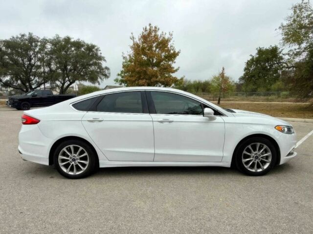 Белый Форд Фьюжн, объемом двигателя 2 л и пробегом 52 тыс. км за 2700 $, фото 5 на Automoto.ua