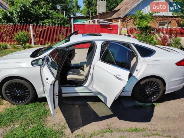 Білий Форд Фьюжен, об'ємом двигуна 2 л та пробігом 75 тис. км за 18000 $, фото 12 на Automoto.ua