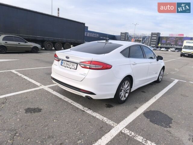 Білий Форд Фьюжен, об'ємом двигуна 2 л та пробігом 225 тис. км за 13350 $, фото 1 на Automoto.ua