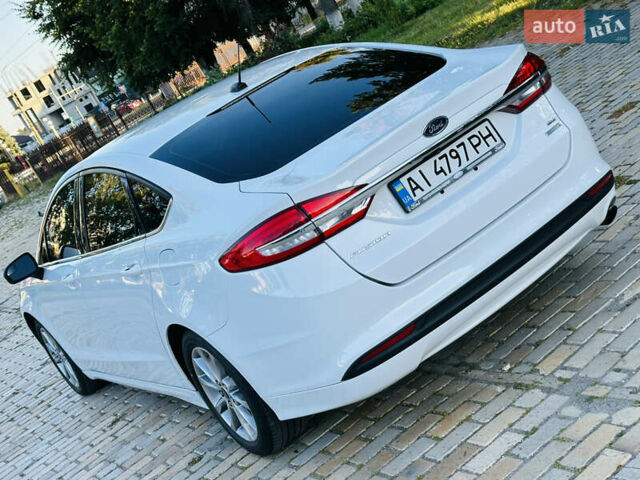 Білий Форд Фьюжен, об'ємом двигуна 1.5 л та пробігом 106 тис. км за 12500 $, фото 12 на Automoto.ua