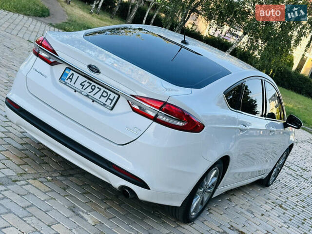 Білий Форд Фьюжен, об'ємом двигуна 1.5 л та пробігом 106 тис. км за 12500 $, фото 11 на Automoto.ua