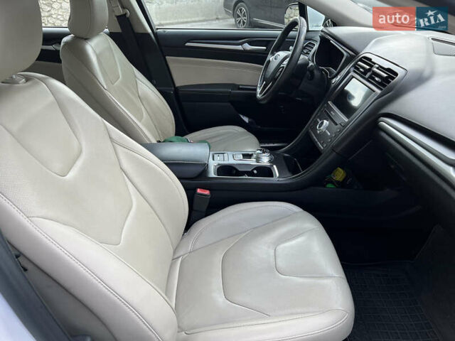 Білий Форд Фьюжен, об'ємом двигуна 2 л та пробігом 183 тис. км за 14500 $, фото 19 на Automoto.ua