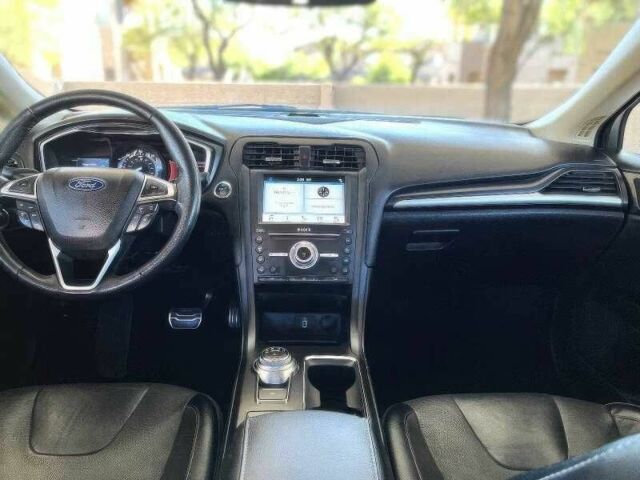 Білий Форд Фьюжен, об'ємом двигуна 2 л та пробігом 89 тис. км за 7000 $, фото 10 на Automoto.ua