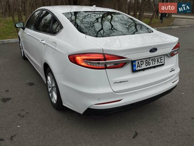 Білий Форд Фьюжен, об'ємом двигуна 2 л та пробігом 93 тис. км за 16500 $, фото 4 на Automoto.ua