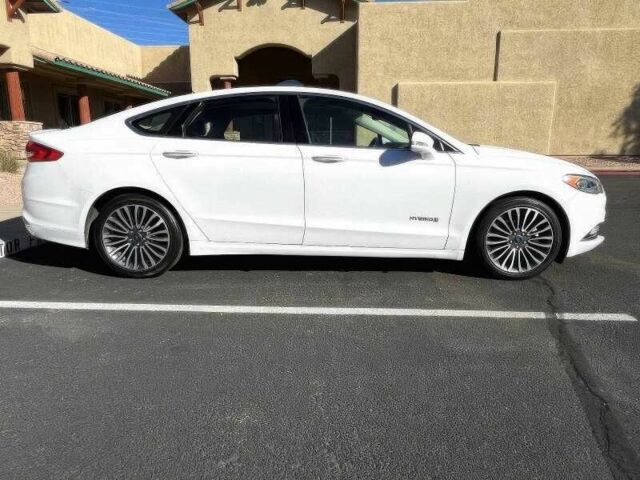 Білий Форд Фьюжен, об'ємом двигуна 2 л та пробігом 89 тис. км за 7000 $, фото 5 на Automoto.ua