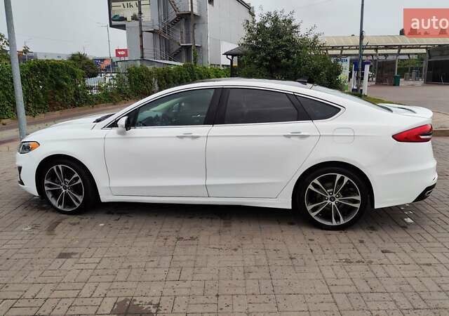 Білий Форд Фьюжен, об'ємом двигуна 2 л та пробігом 125 тис. км за 12500 $, фото 5 на Automoto.ua