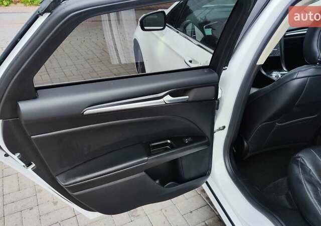 Білий Форд Фьюжен, об'ємом двигуна 2 л та пробігом 125 тис. км за 12500 $, фото 14 на Automoto.ua