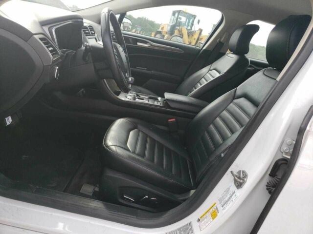 Білий Форд Фьюжен, об'ємом двигуна 2 л та пробігом 129 тис. км за 1500 $, фото 6 на Automoto.ua