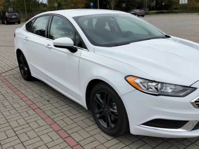 Білий Форд Фьюжен, об'ємом двигуна 2 л та пробігом 125 тис. км за 10600 $, фото 1 на Automoto.ua