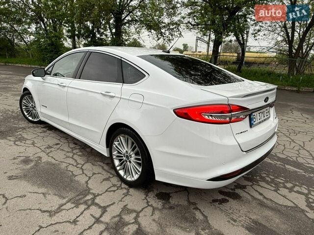 Білий Форд Фьюжен, об'ємом двигуна 2 л та пробігом 110 тис. км за 15950 $, фото 8 на Automoto.ua