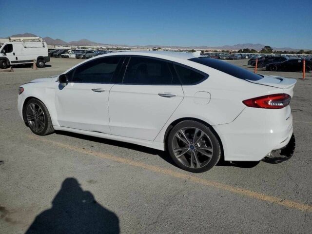 Белый Форд Фьюжн, объемом двигателя 2 л и пробегом 105 тыс. км за 2400 $, фото 1 на Automoto.ua