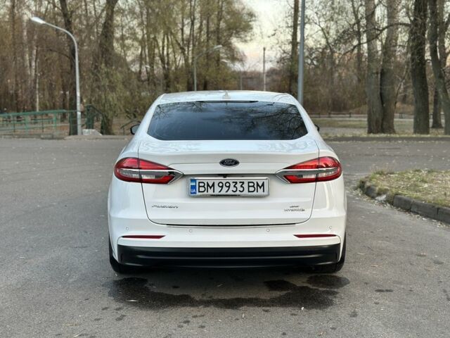 Білий Форд Фьюжен, об'ємом двигуна 2 л та пробігом 111 тис. км за 16700 $, фото 3 на Automoto.ua