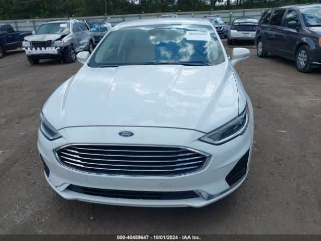 Білий Форд Фьюжен, об'ємом двигуна 2 л та пробігом 118 тис. км за 2100 $, фото 11 на Automoto.ua