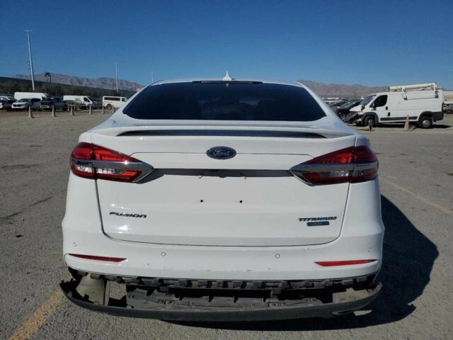 Белый Форд Фьюжн, объемом двигателя 2 л и пробегом 105 тыс. км за 2400 $, фото 5 на Automoto.ua