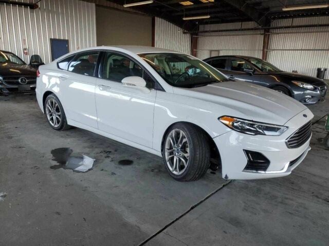 Білий Форд Фьюжен, об'ємом двигуна 1.5 л та пробігом 46 тис. км за 11000 $, фото 3 на Automoto.ua