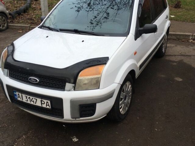 Белый Форд Фьюжн, объемом двигателя 1.4 л и пробегом 247 тыс. км за 5900 $, фото 4 на Automoto.ua