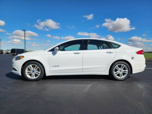 Білий Форд Фьюжен, об'ємом двигуна 2 л та пробігом 48 тис. км за 1450 $, фото 6 на Automoto.ua