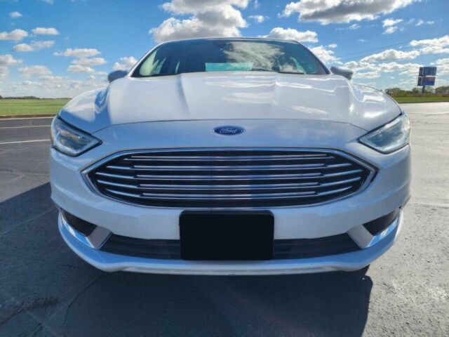 Білий Форд Фьюжен, об'ємом двигуна 2 л та пробігом 48 тис. км за 1450 $, фото 1 на Automoto.ua