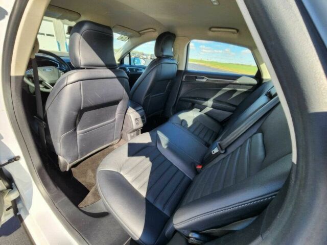 Білий Форд Фьюжен, об'ємом двигуна 2 л та пробігом 48 тис. км за 1450 $, фото 11 на Automoto.ua