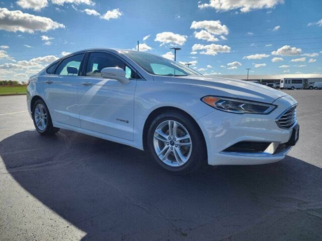 Білий Форд Фьюжен, об'ємом двигуна 2 л та пробігом 48 тис. км за 1450 $, фото 2 на Automoto.ua