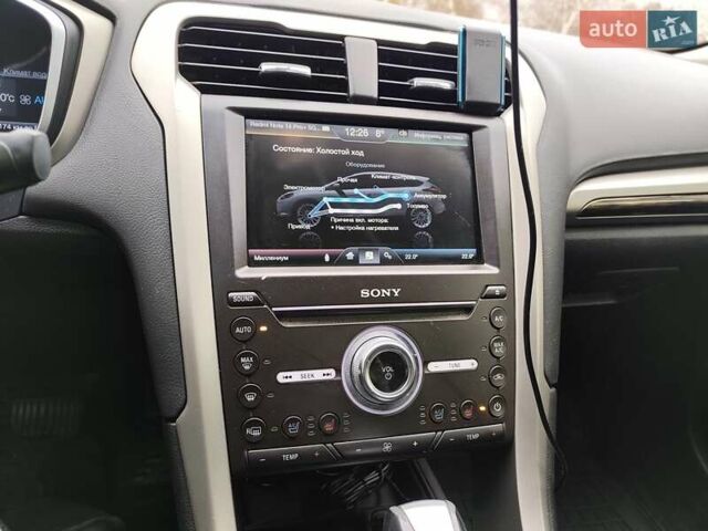 Бежевий Форд Фьюжен, об'ємом двигуна 2 л та пробігом 210 тис. км за 12700 $, фото 26 на Automoto.ua