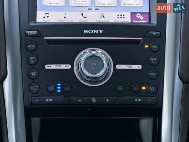 Бежевый Форд Фьюжн, объемом двигателя 2 л и пробегом 144 тыс. км за 13300 $, фото 30 на Automoto.ua