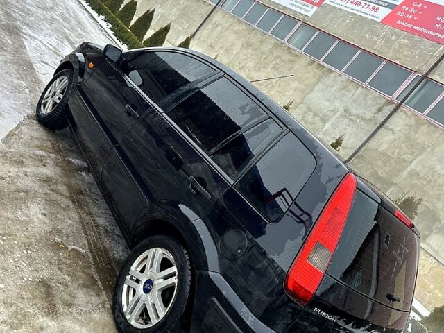 Черный Форд Фьюжн, объемом двигателя 1.6 л и пробегом 123 тыс. км за 4500 $, фото 4 на Automoto.ua