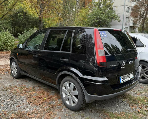 Чорний Форд Фьюжен, об'ємом двигуна 1.4 л та пробігом 186 тис. км за 4500 $, фото 4 на Automoto.ua