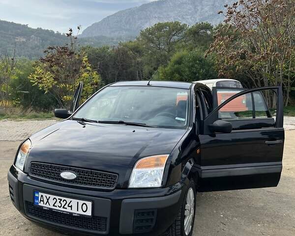 Черный Форд Фьюжн, объемом двигателя 1.39 л и пробегом 245 тыс. км за 5200 $, фото 7 на Automoto.ua