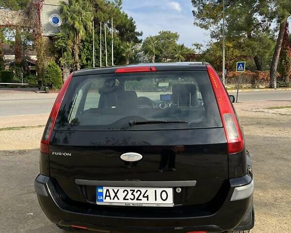 Черный Форд Фьюжн, объемом двигателя 1.39 л и пробегом 245 тыс. км за 5200 $, фото 9 на Automoto.ua